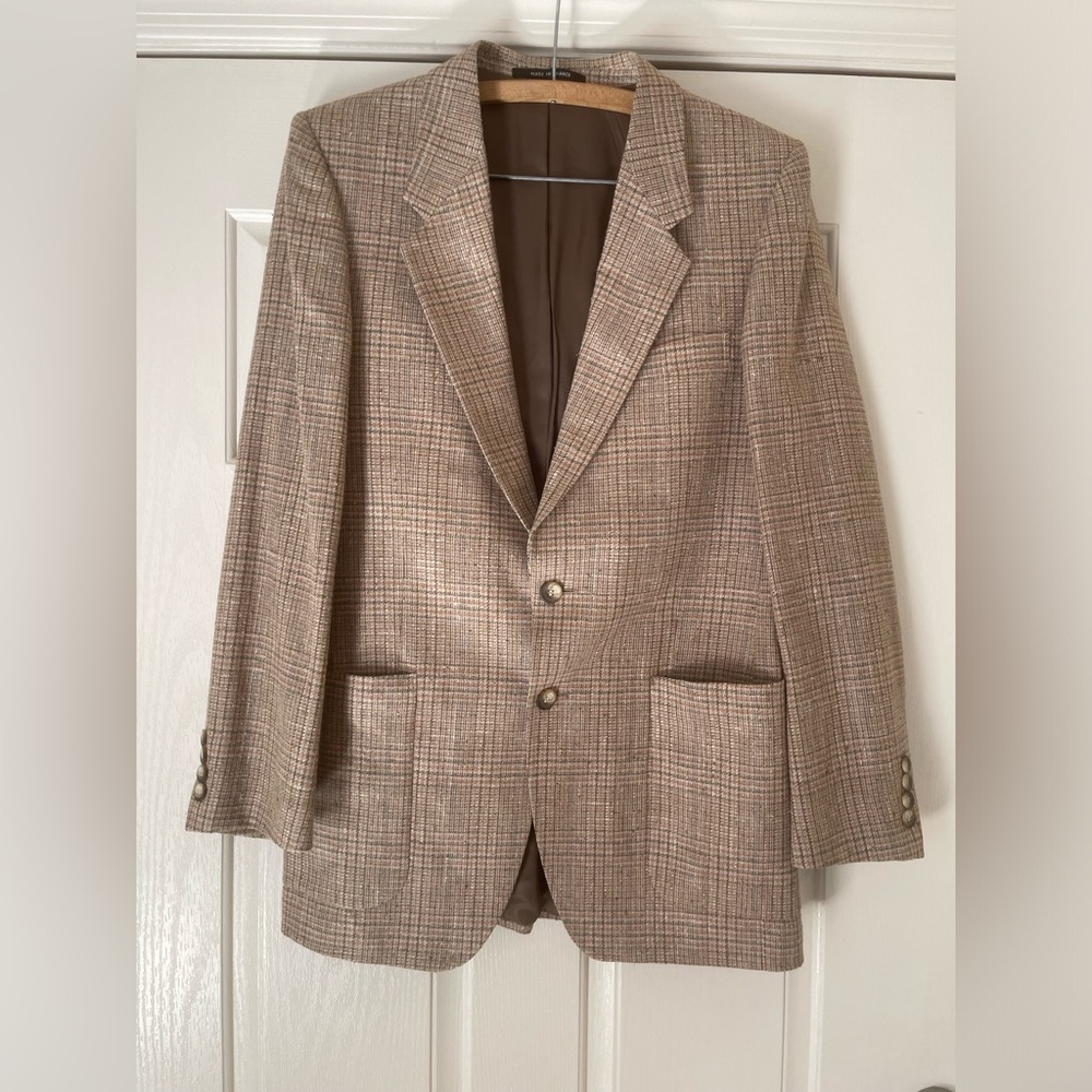 - Vintage Yves Saint Laurent Wool Houndstooth blazer.